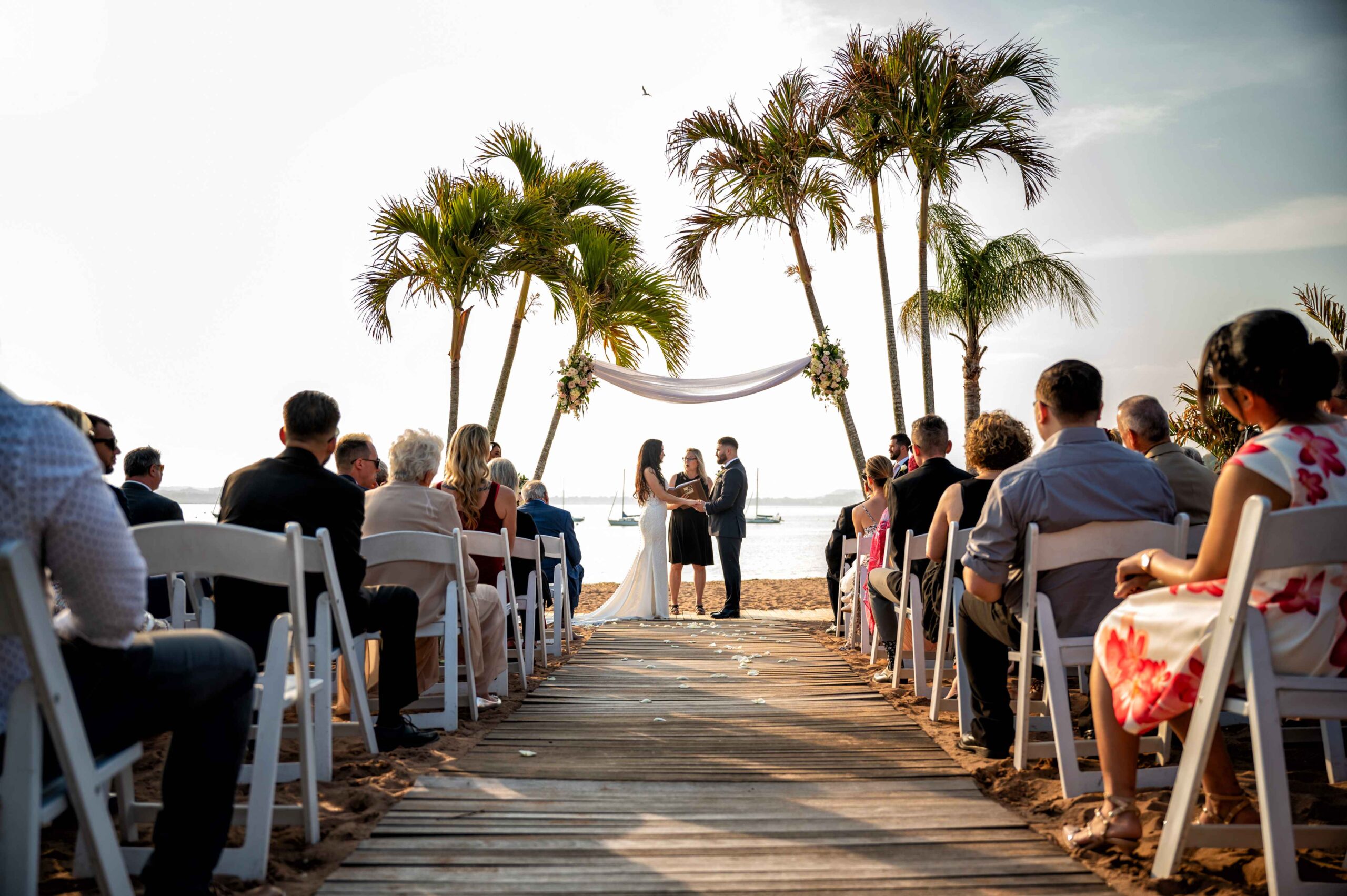 A look down the aisle during a beautiful beach wedding at Anthony's Ocean View in New Haven, CT